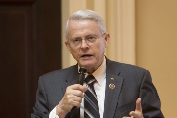 State Sen. Richard Black, R-Loudon, gestures during a debate on the floor of the Senate during the session at the Capitol in Richmond, Va., Tuesday, Feb. 2, 2016.   (AP Photo/Steve Helber)