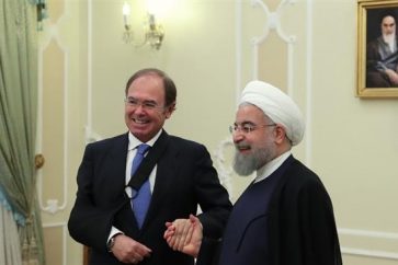 Hassan Rohani y Pío García Escudero