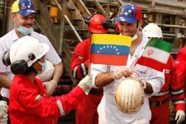 trabajadores-banderas-venezuela-iran