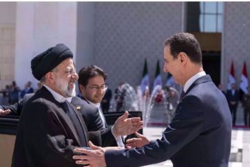 assad-raisi-abrazo