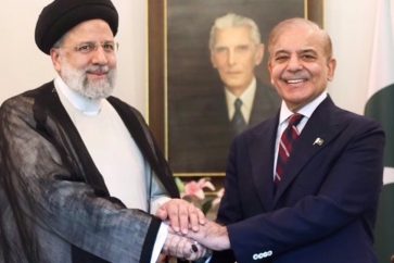 Ebrahim Raisi y Shehbaz Sharif